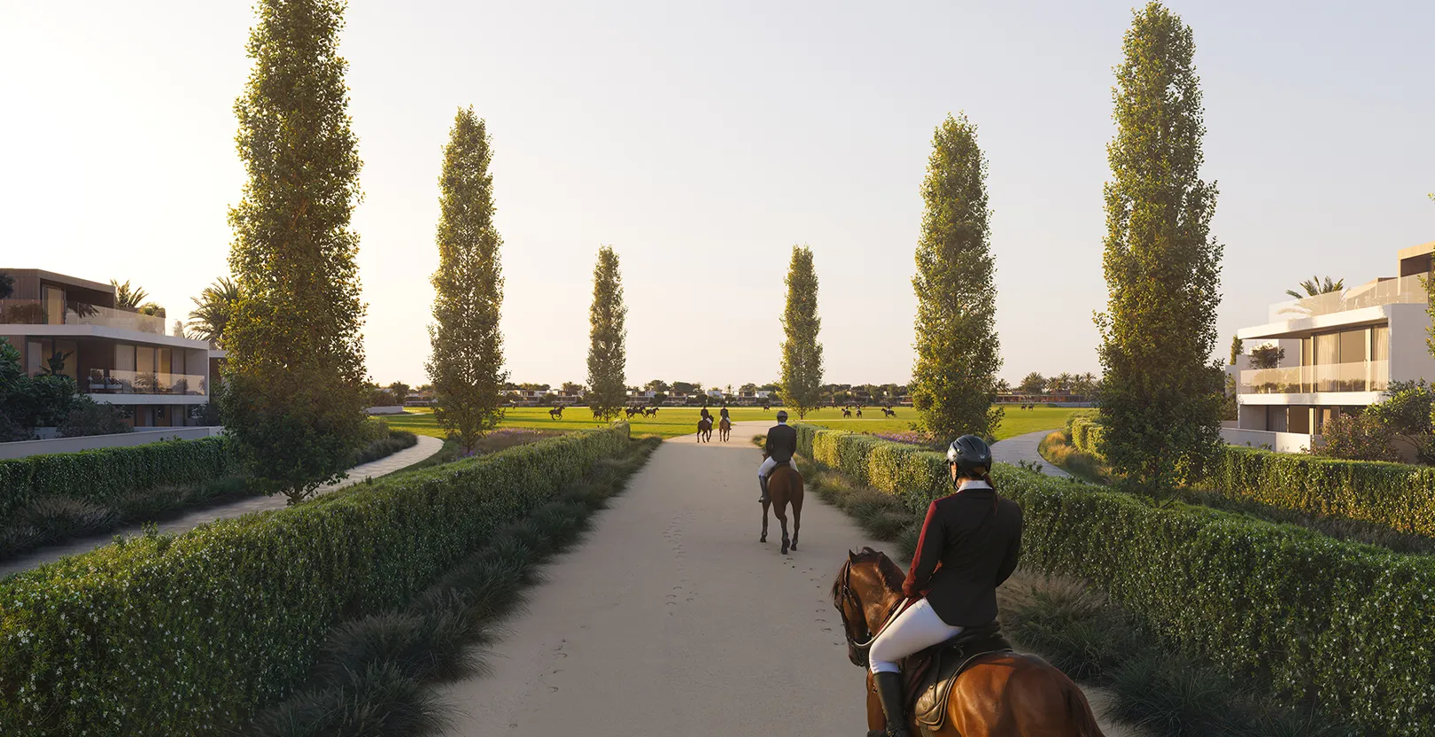 Riders on horseback on a tree-lined path through the community