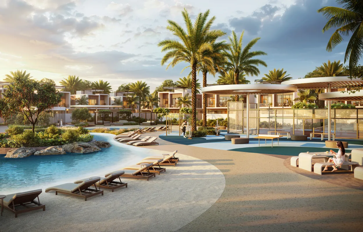 Lagoon beach with loungers in front of the clubhouse